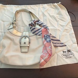 Cream colored coach purse & tie